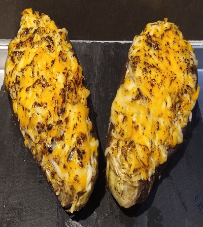 BERENJENAS RELLENAS DE RAPE Y BOCAS DE MAR